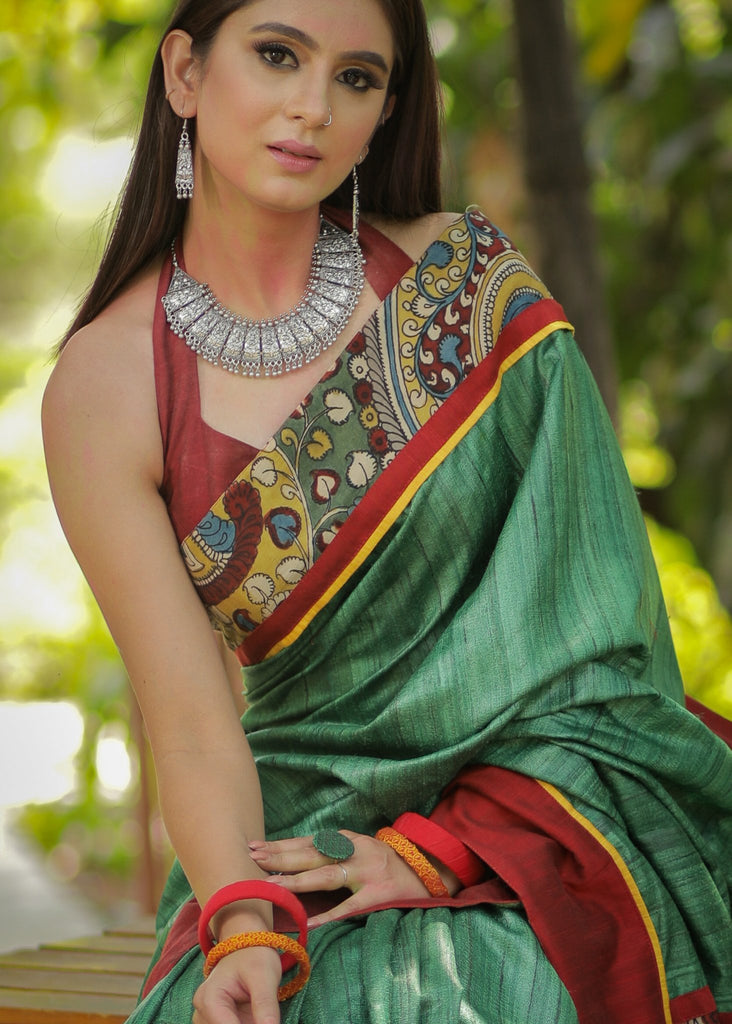 Green pure raw silk saree with hand painted kalamkari pallu & border