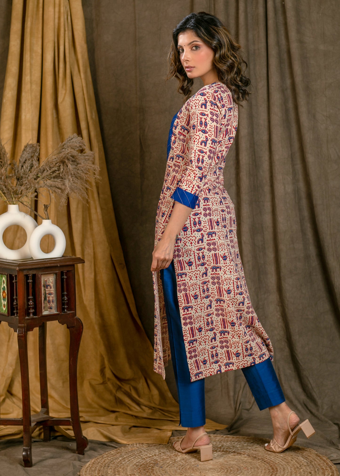 Exclusive Off-White Animal Print Cotton Ajrakh Straight Cut Kurta with Blue Silk Detailing - Pant Optional