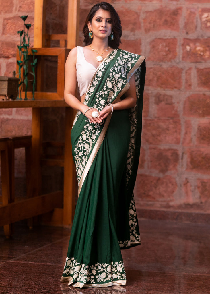 Forest green Muslin saree with parsi embroidered border