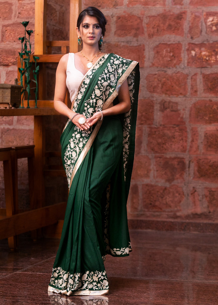 Forest green Muslin saree with parsi embroidered border