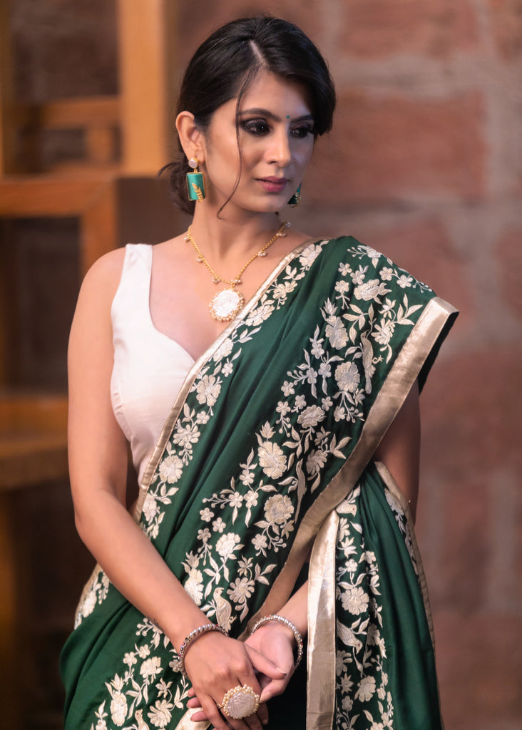 Forest green Muslin saree with parsi embroidered border