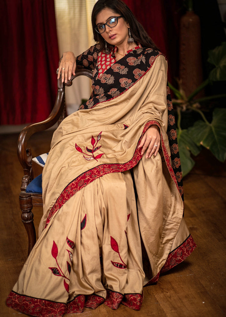 Beige semi silk saree with exclusive hand applic work