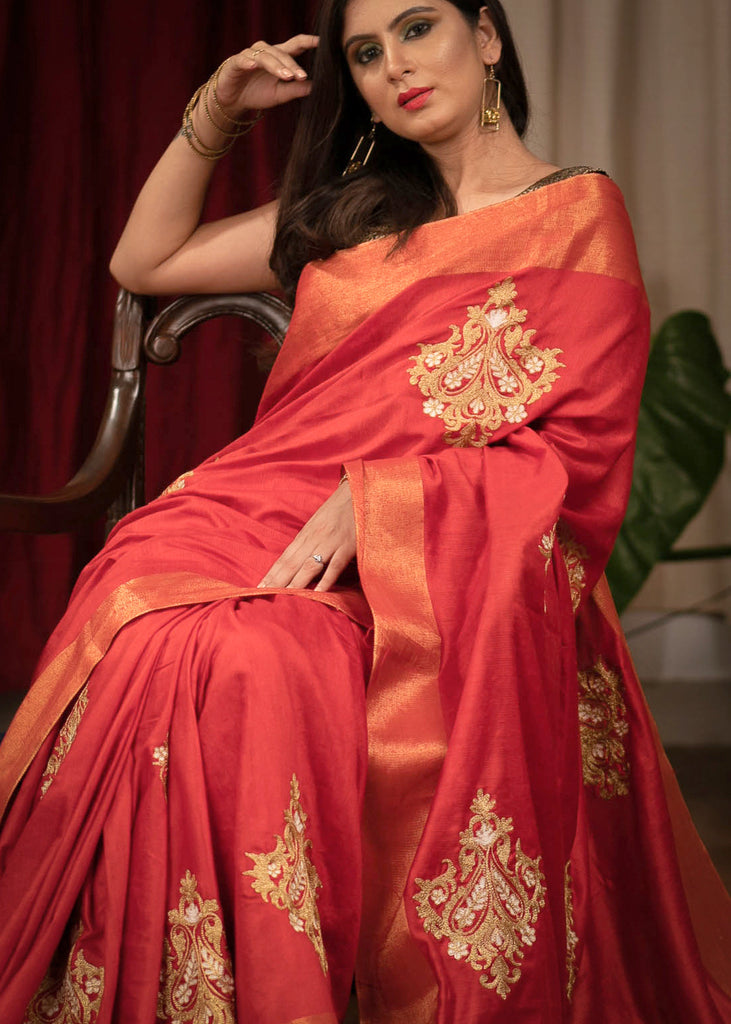 Red cotton silk saree with heavy embroidered motifs