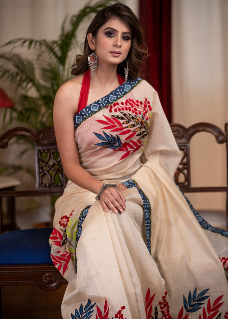 Exclusive chanderi saree with exquisite floral applic work & indigo border