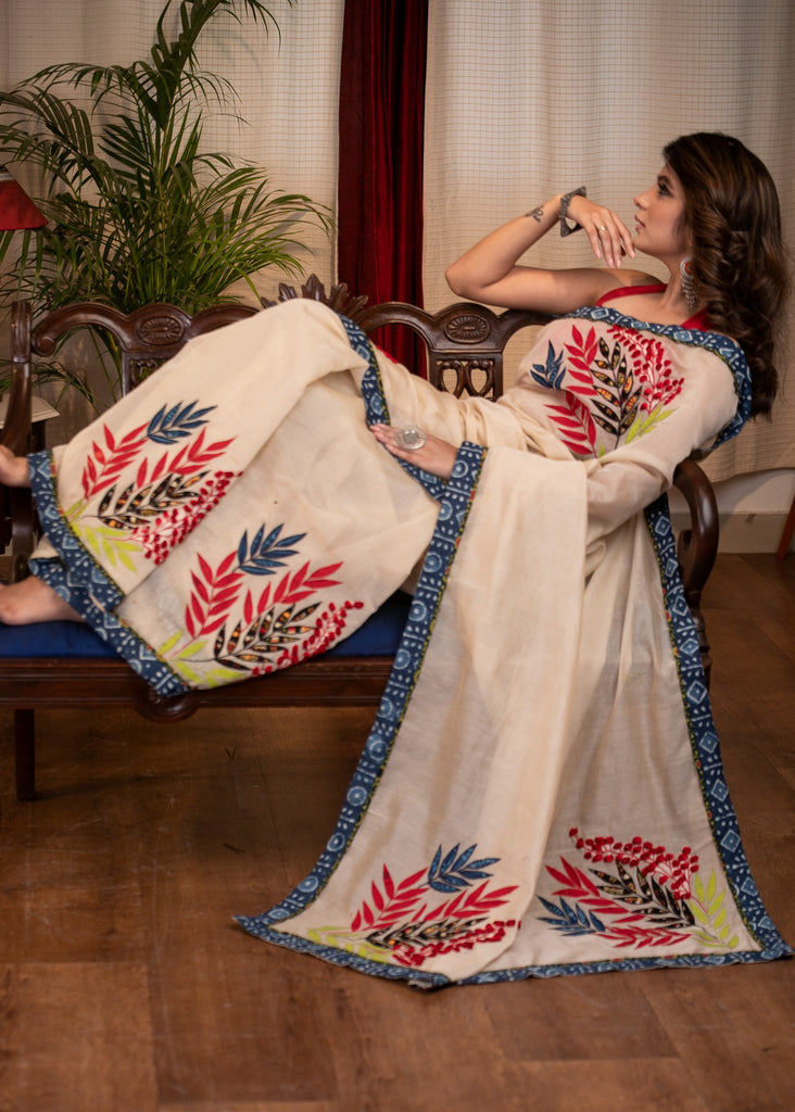 Exclusive chanderi saree with exquisite floral applic work & indigo border