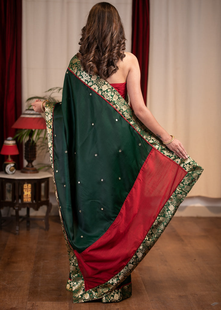 Forest green satin saree with benarasi border & mirrror work all over