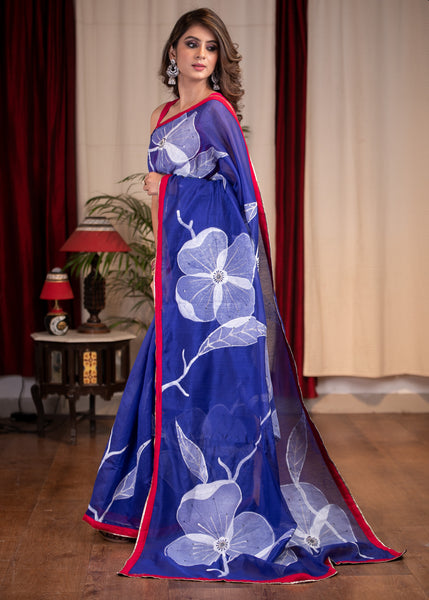 Exclusive floral hand painted blue chanderi saree with embroidered embellishments
