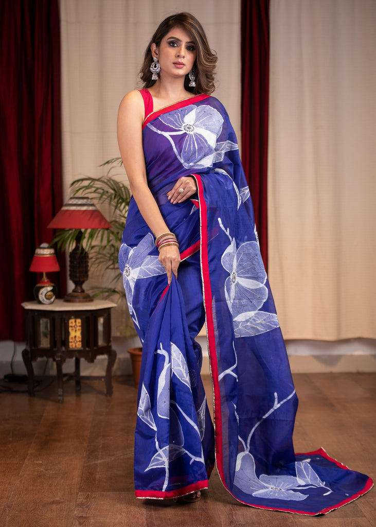 Exclusive floral hand painted blue chanderi saree with embroidered embellishments