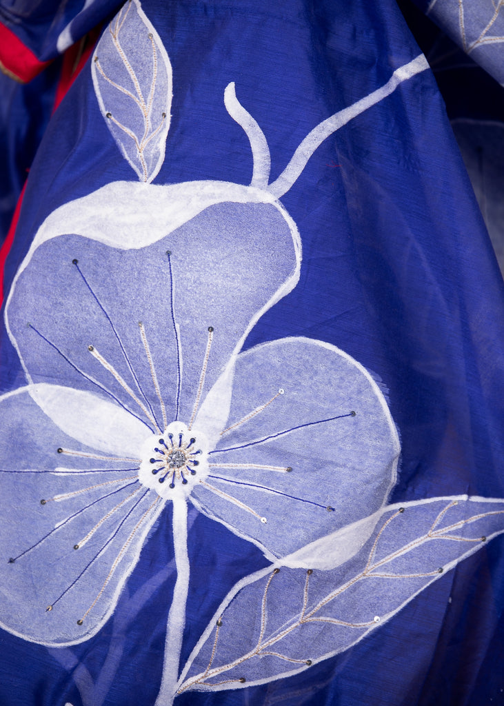 Exclusive floral hand painted blue chanderi saree with embroidered embellishments