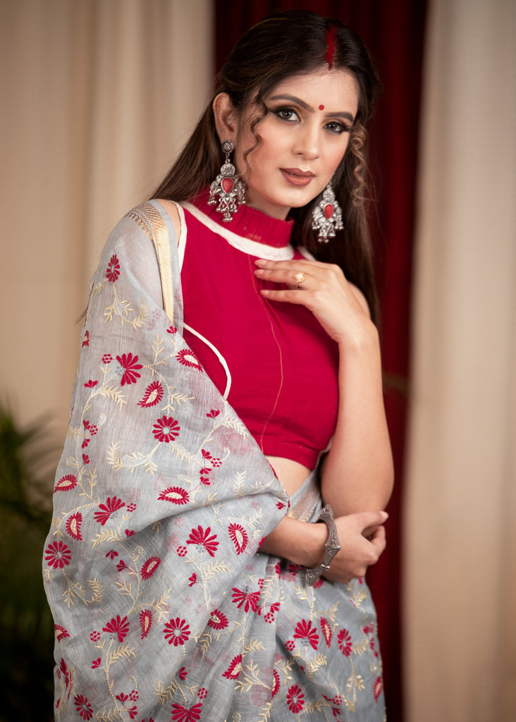 Exclusive embroidered olive pure linen saree