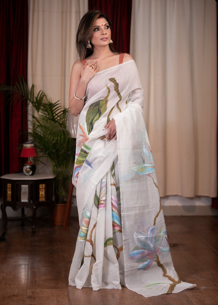Exclusive hand painted white chanderi saree with floral motifs
