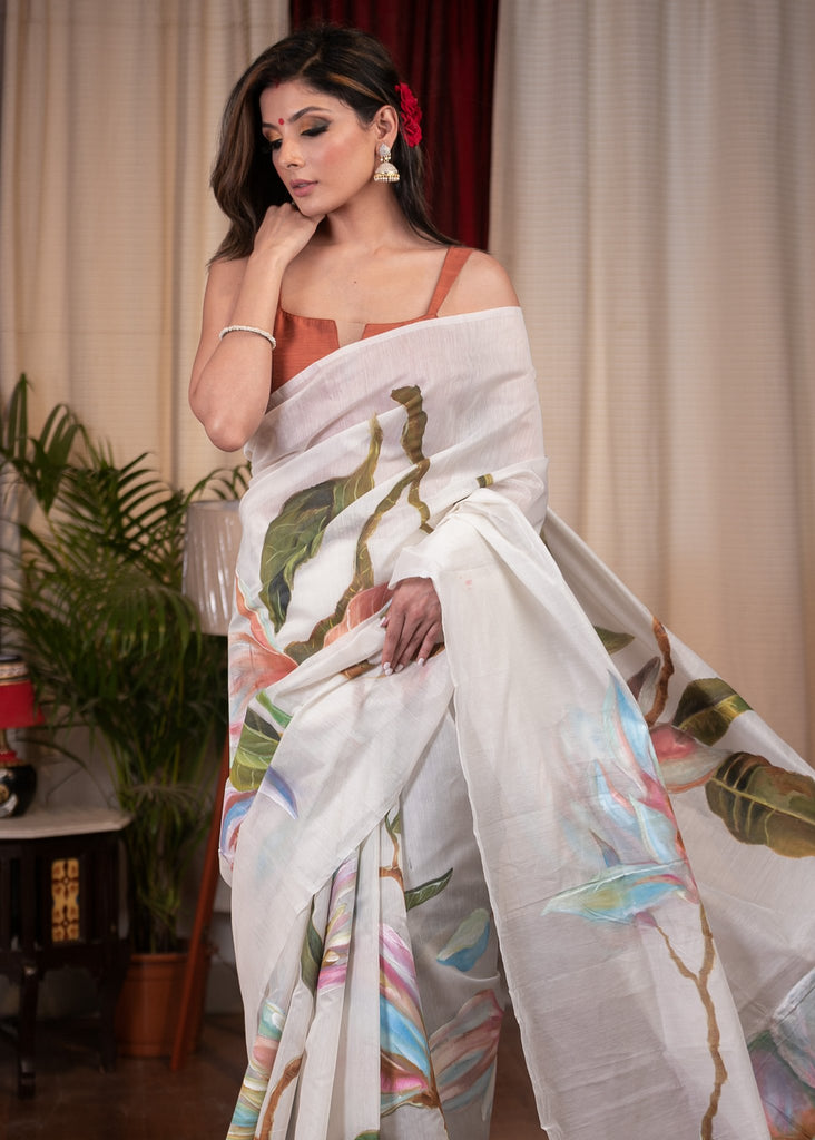 Exclusive hand painted white chanderi saree with floral motifs