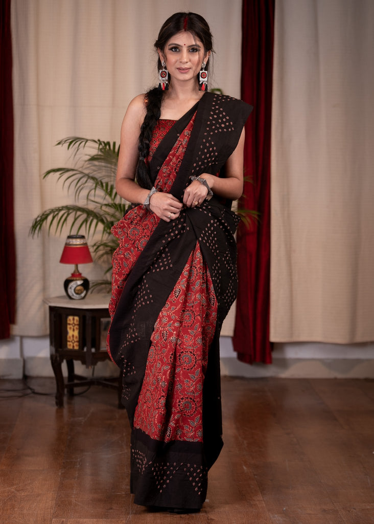 Exclusive maroon Ajrakh saree with Bandhej border