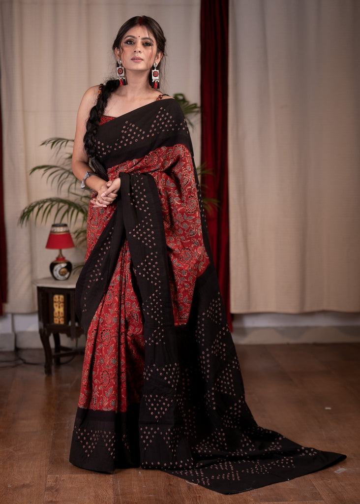 Exclusive maroon Ajrakh saree with Bandhej border