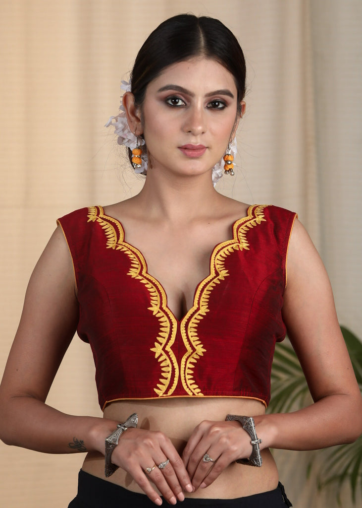 Maroon Cotton Silk Designer Blouse With Scalop Neck line , Contrast Embroidery and Bow At the Back