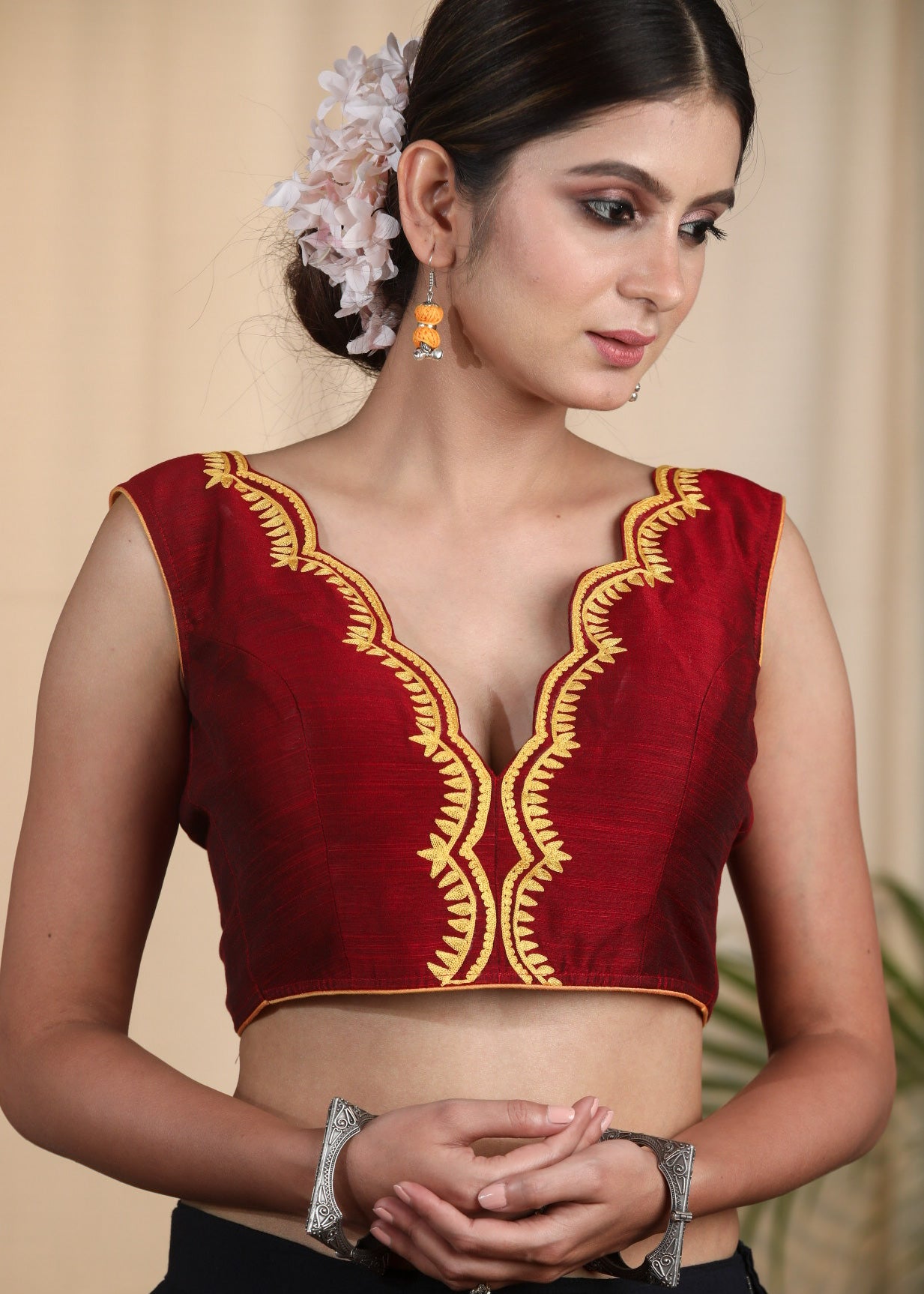 Maroon Cotton Silk Designer Blouse With Scalop Neck line , Contrast Embroidery and Bow At the Back