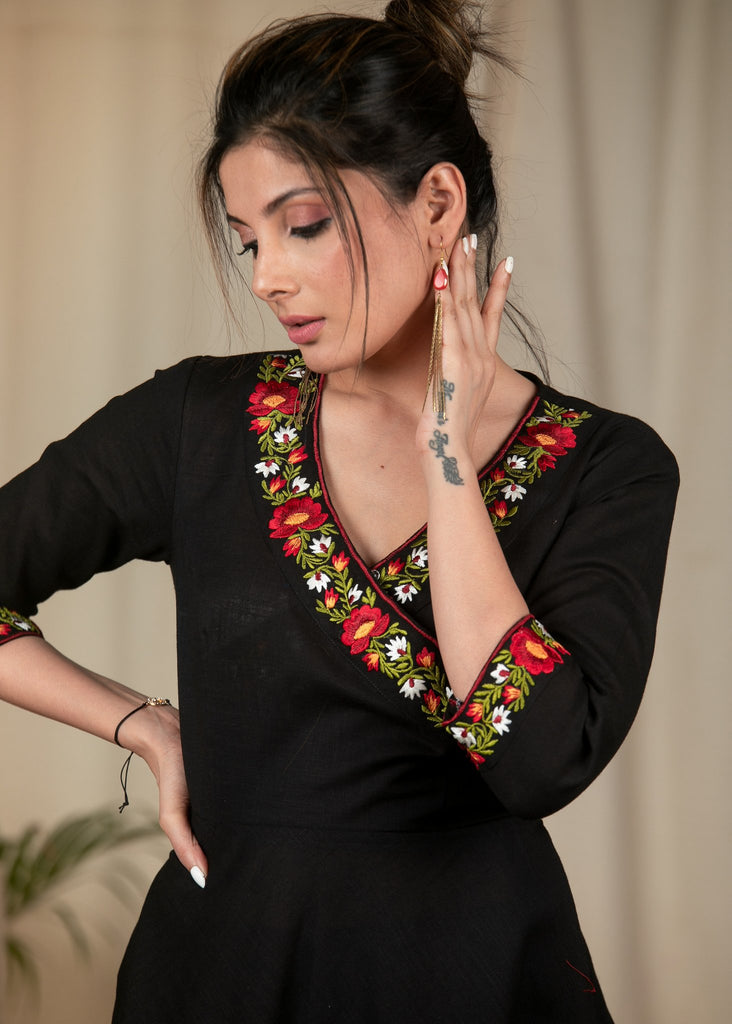 Exclusive black cotton dress with embroidered motifs