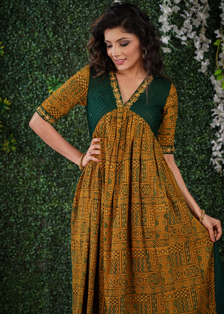 Mustard Ajrakh Cotton Kurta with embroidery on sleeves & Neckline .