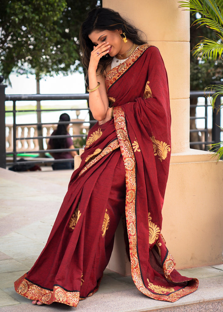 Maroon cotton saree with exclusive embroidered motifs and banarasi border