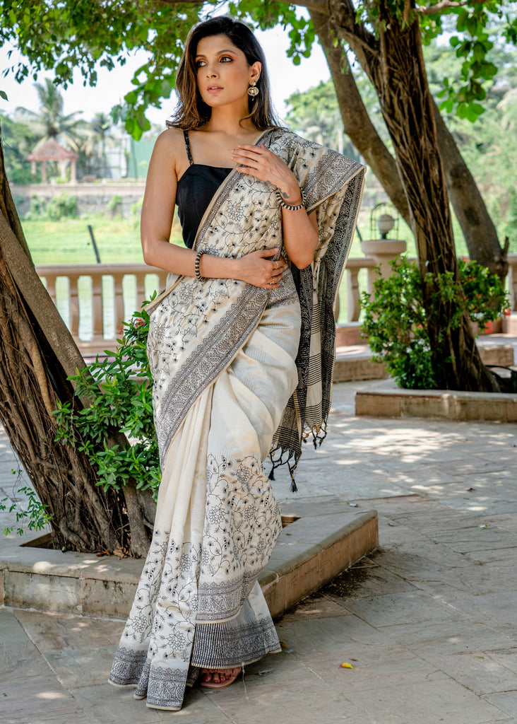 Classic semi sillk heavy embroidered off white saree