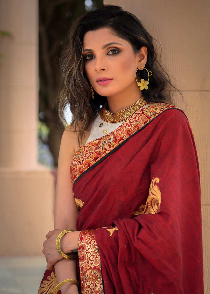 Maroon cotton saree with exclusive embroidered motifs and banarasi border