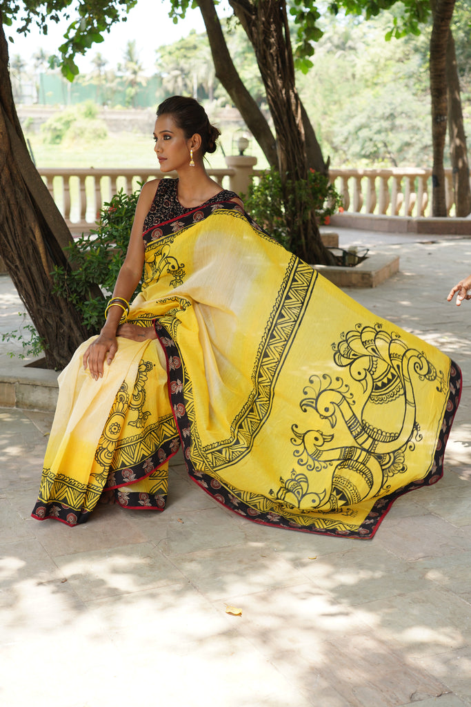 Beautiful handpainted yellow chanderi saree with Ajrakh border