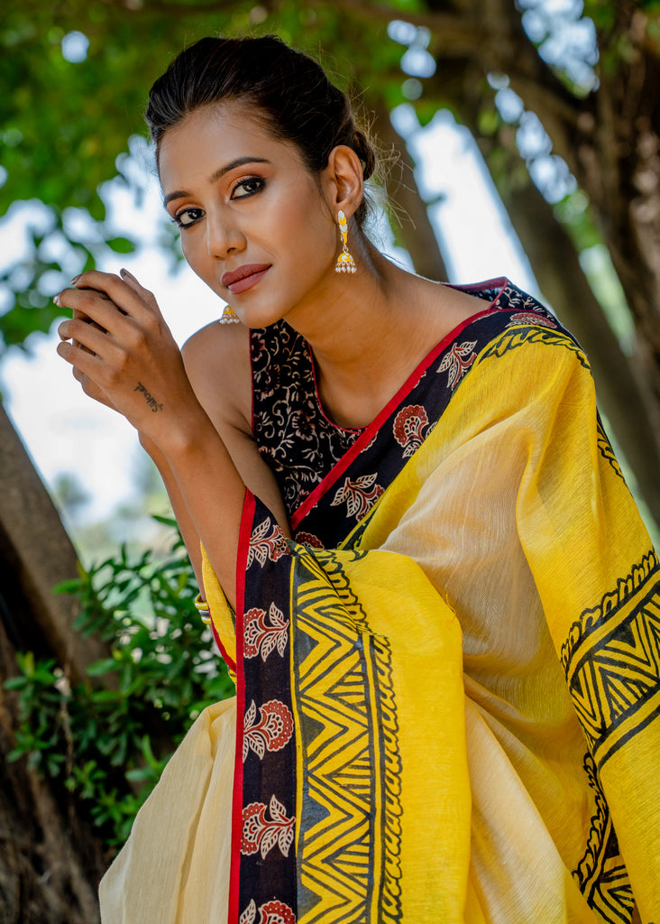 Beautiful handpainted yellow chanderi saree with Ajrakh border