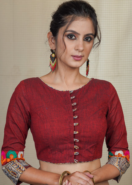 Maroon Cotton Handloom Blouse with Kalamkari and embroidered lace at the sleeves .Lining given