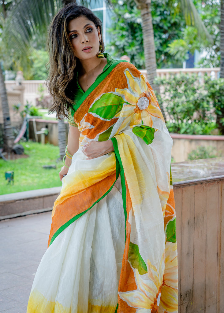 Fancy Cotton Floral handpainted saree with delicate moti work