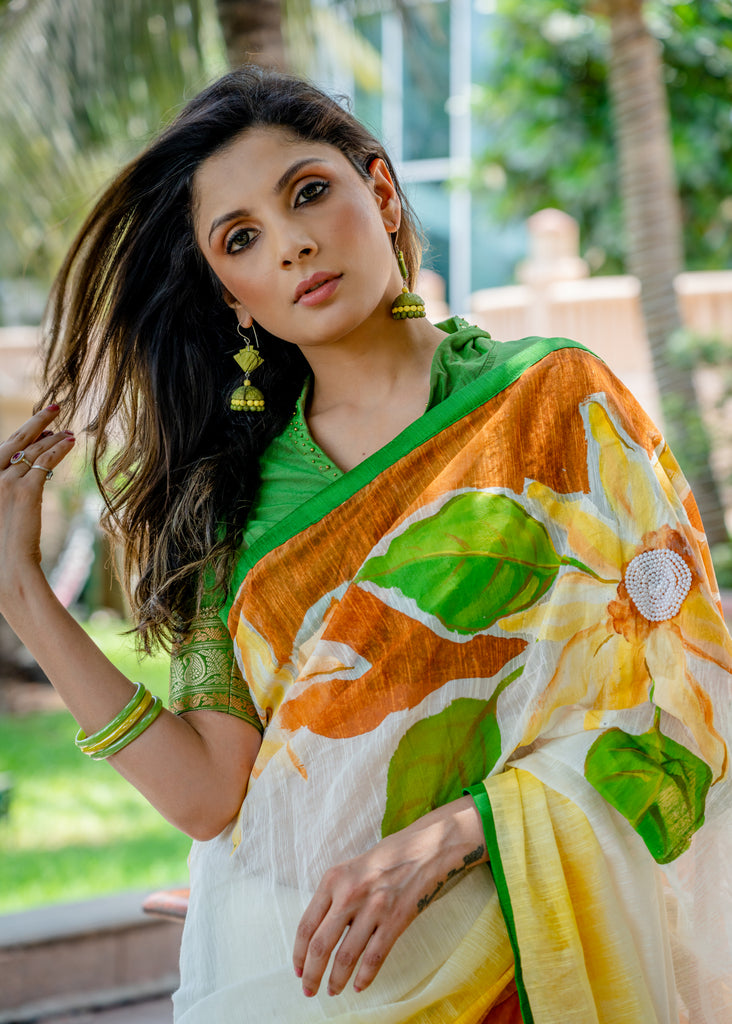 Fancy Cotton Floral handpainted saree with delicate moti work