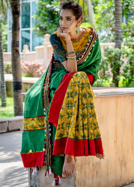 Beautiful green cotton saree with Ajrakh combination saree with delicate woven woolen border
