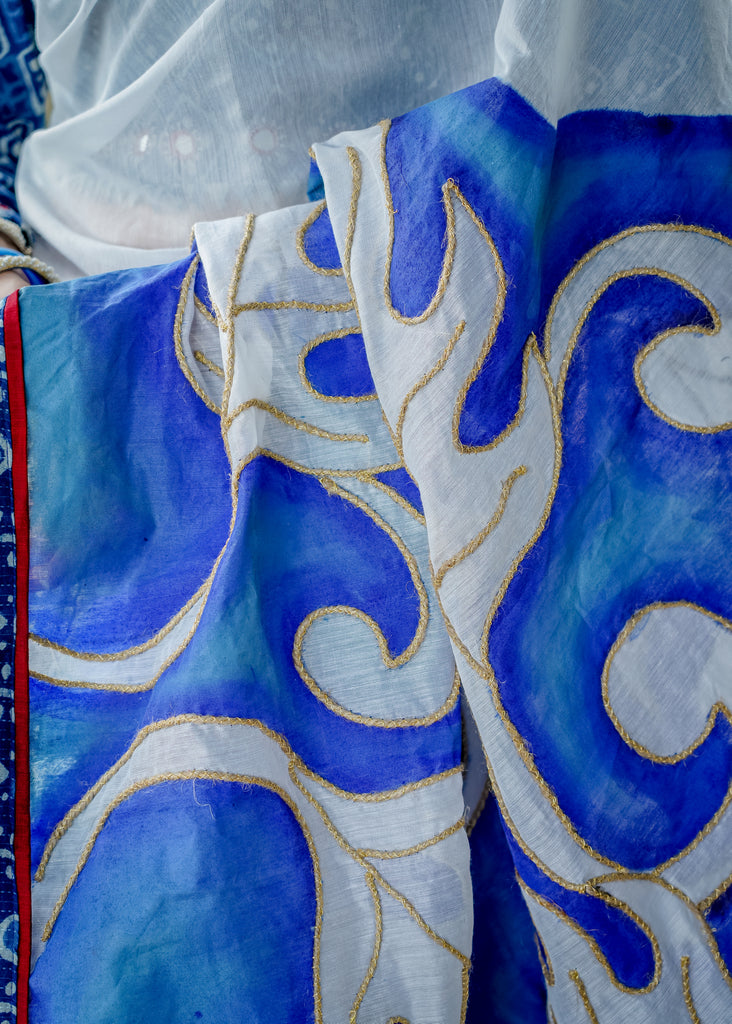 Chanderi blue handpainted saree with golden rope highlighting