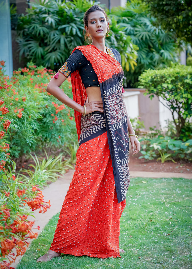 Beautiful orange cotton saree with exclusive Ajrakh & Bandhej combination