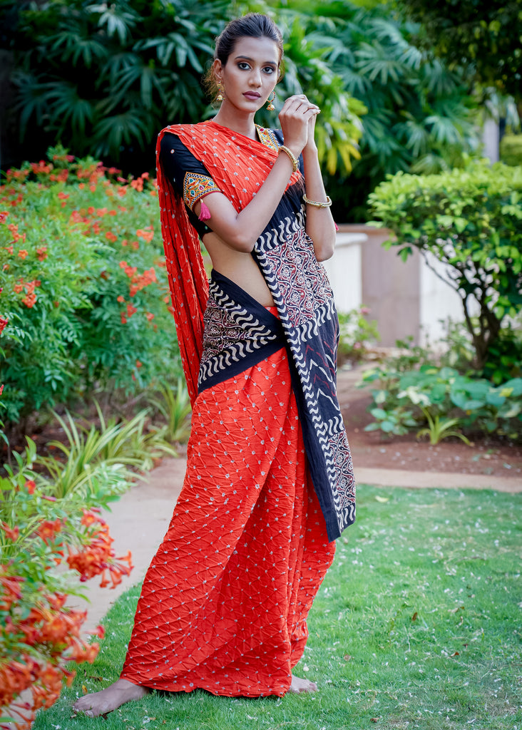 Beautiful orange cotton saree with exclusive Ajrakh & Bandhej combination