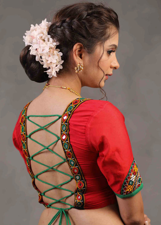 Elegant Red Cotton Silk Blouse Highlighted with Kutch Mirror Work Patch on Sleeves and Neckline