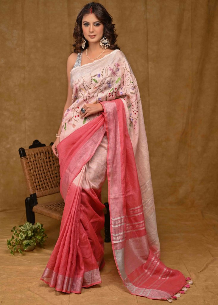 Exclusive Pink Linen Saree with Hand Embroidery and Zari Border