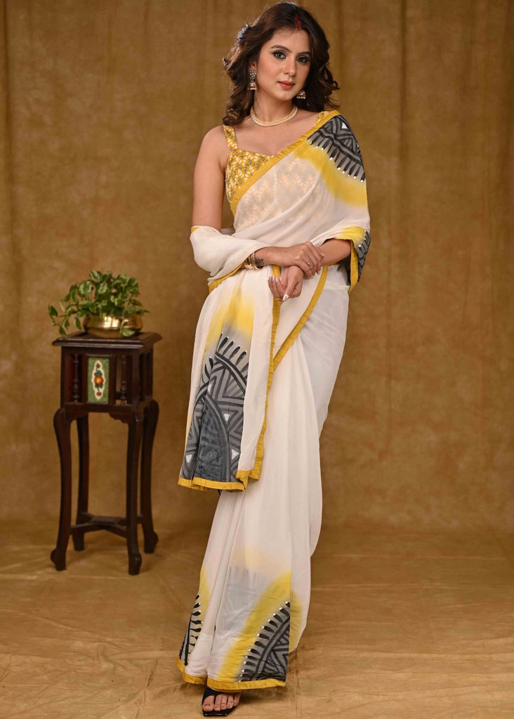 White And Yellow Chiffon Saree with Exclusive Hand painting and Yellow Cotton Silk Border