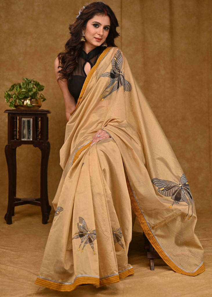 Designer Beige Chanderi Saree with Mustard Ajrakh Border and Delicate Grey Handpainted Butterfly Motif