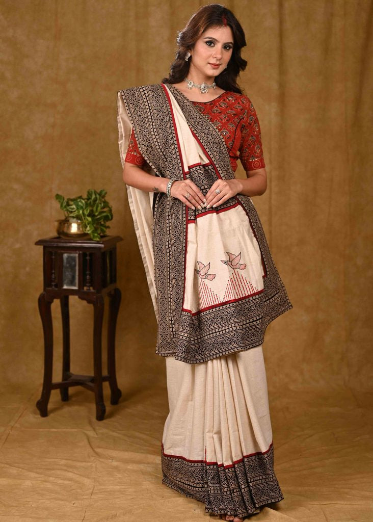 Cream Cotton Saree with Elegant Ajrakh Border and Gond Painting