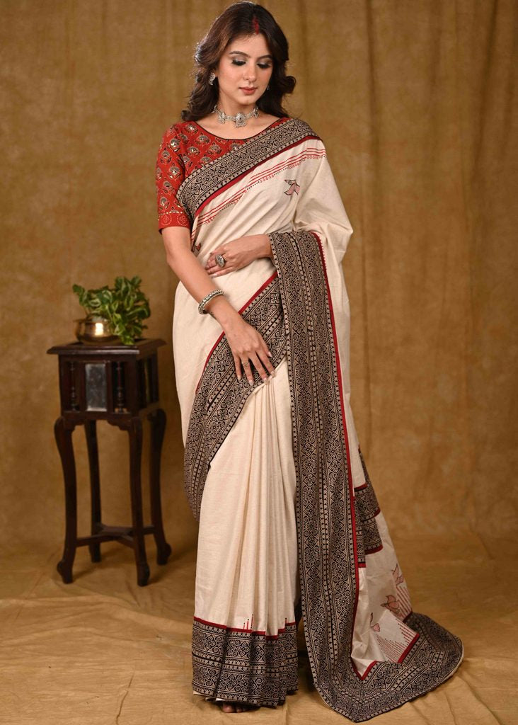 Cream Cotton Saree with Elegant Ajrakh Border and Gond Painting