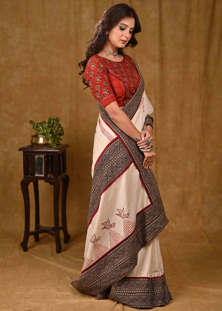 Cream Cotton Saree with Elegant Ajrakh Border and Gond Painting