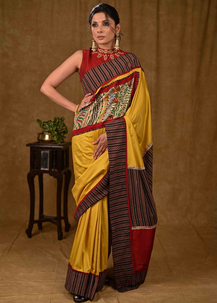 Mustard Assam Silk Saree with Exclusive Madhubani Painting and Ajrakh Border