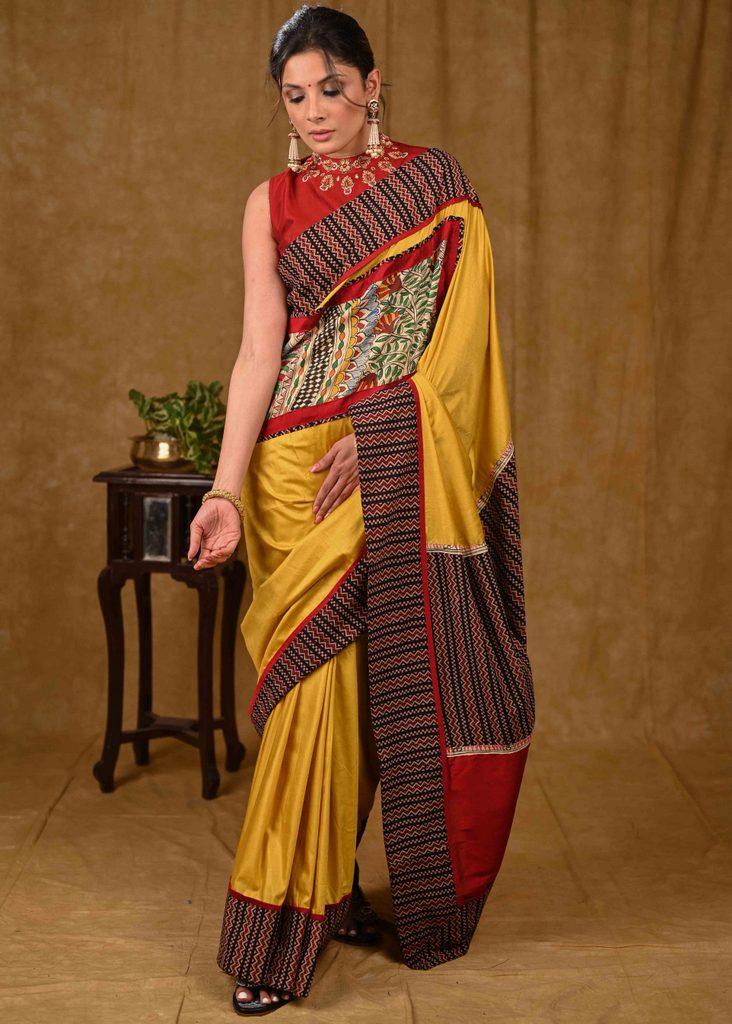 Mustard Assam Silk Saree with Exclusive Madhubani Painting and Ajrakh Border