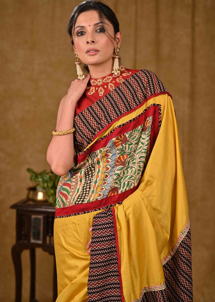 Mustard Assam Silk Saree with Exclusive Madhubani Painting and Ajrakh Border
