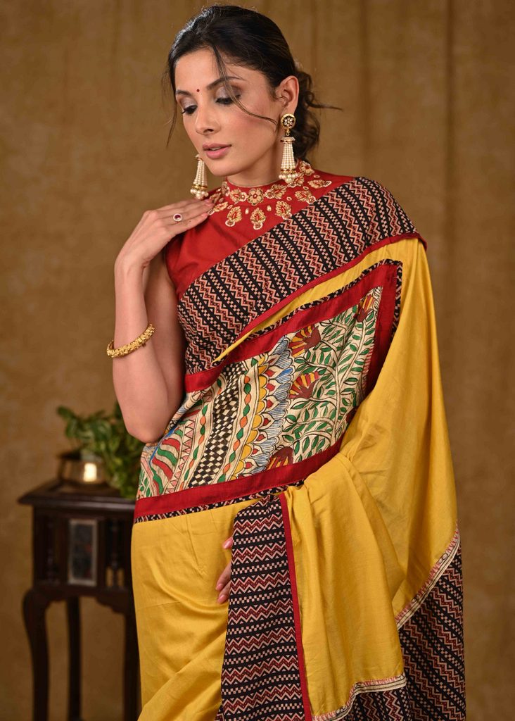 Mustard Assam Silk Saree with Exclusive Madhubani Painting and Ajrakh Border