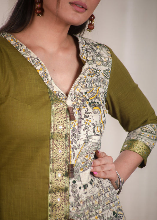 A Line Cotton Mehndi Green Kurta With Classy Madhubani print and Zari Border and Wooden Beads.