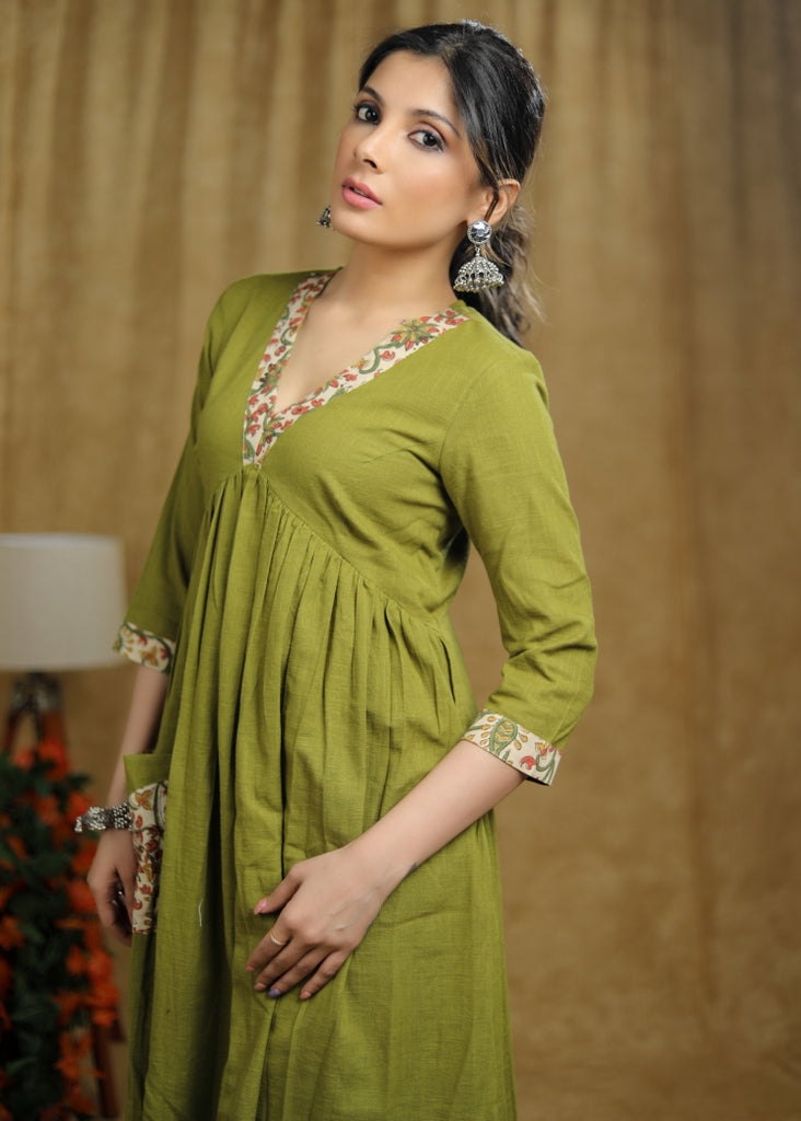 Breezy Mehendi green cotton kurti with floral print detailing & pocket