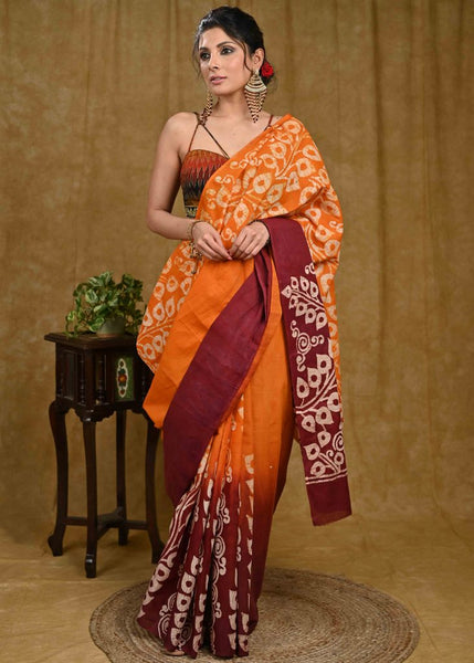 Orange and maroon dyed Exclusive hand Batik cotton saree