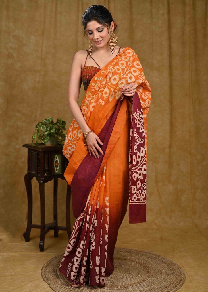 Orange and maroon dyed Exclusive hand Batik cotton saree