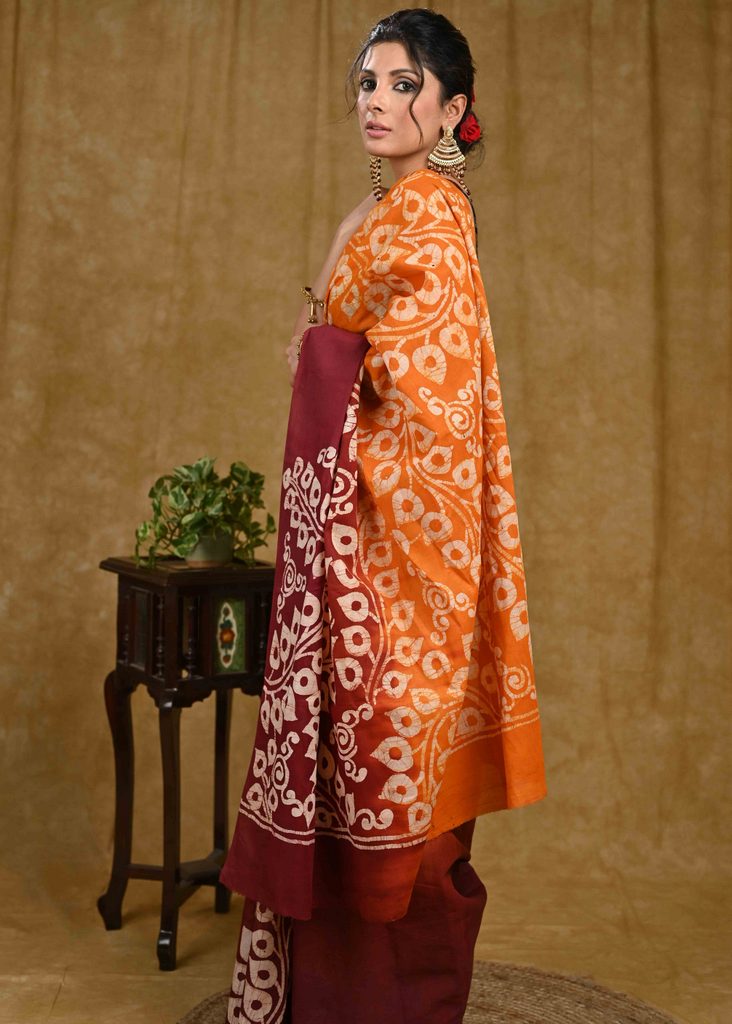 Orange and maroon dyed Exclusive hand Batik cotton saree